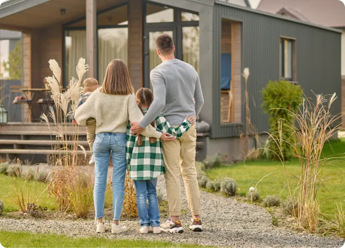 Family admiring their home in Morgan Hill